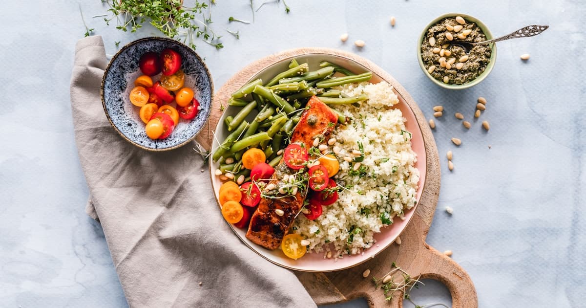 Family dinner table with multiple dishes and customizable toppings