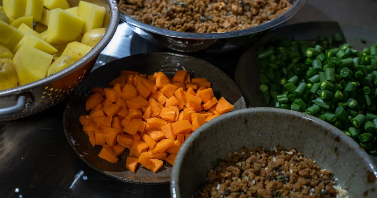 a table topped with bowls filled with different types of food